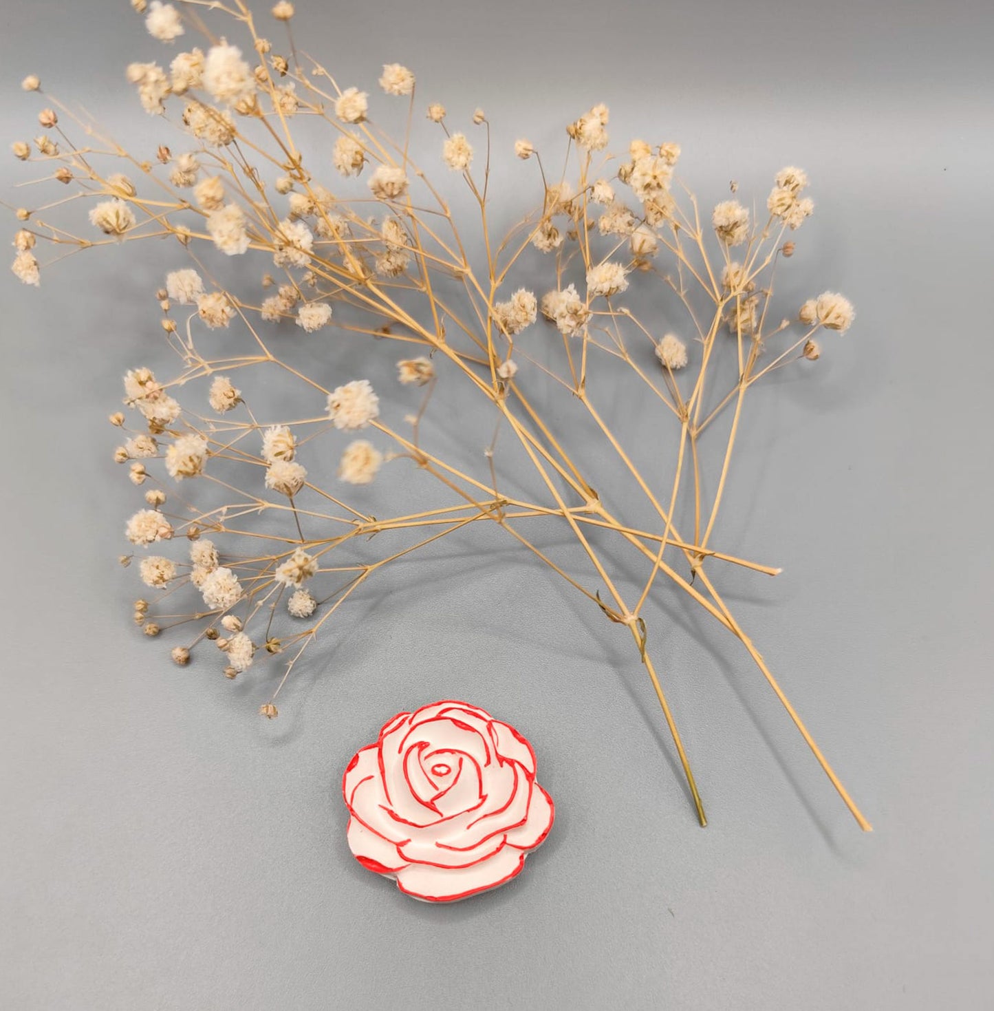 Imán de rosas en arcilla